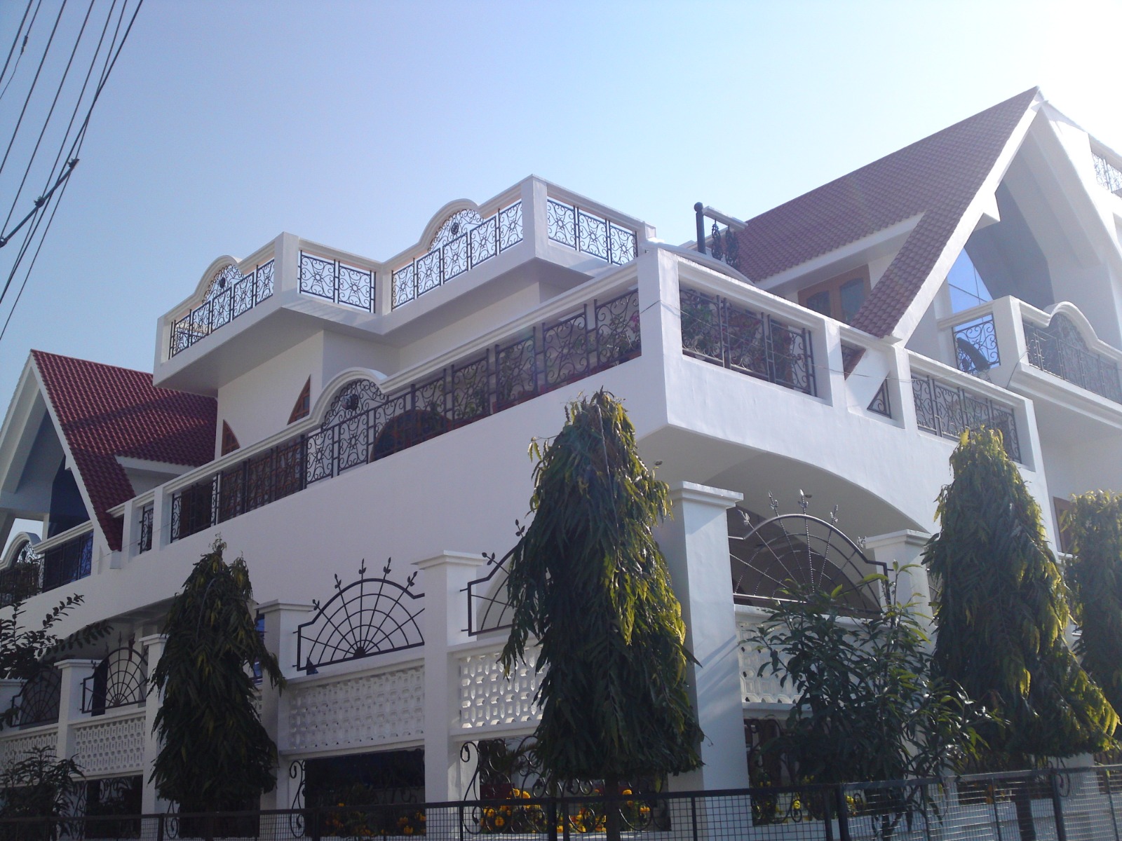 Modern residence — triple-storey villa with ornamental ironwork